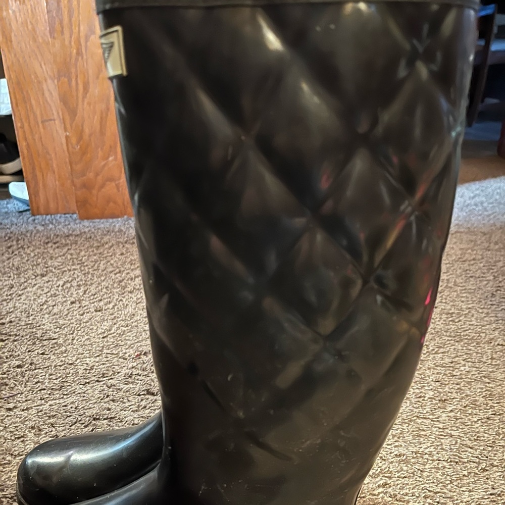 Duck boots, black under knee. Very classic.